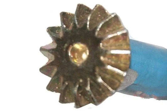 Rusty metal gear with mounting hub on blue shaft