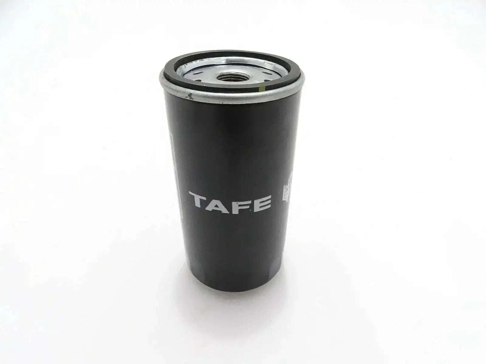 Black oil filter canister with metal top and center hole