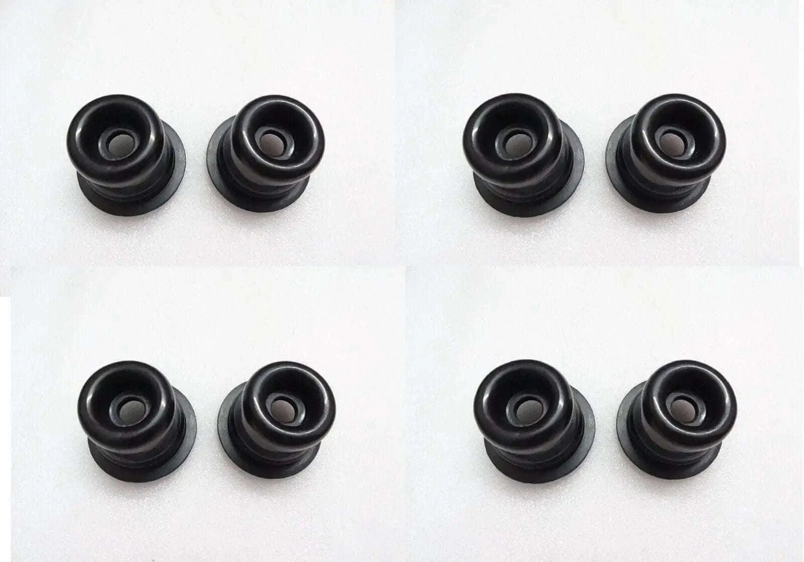 Set of eight black rubber brake actuator rod seals with metal core