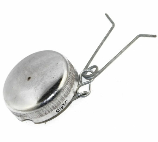 Massey Ferguson model engine oil filler cap, metal, designed for tractor maintenance.