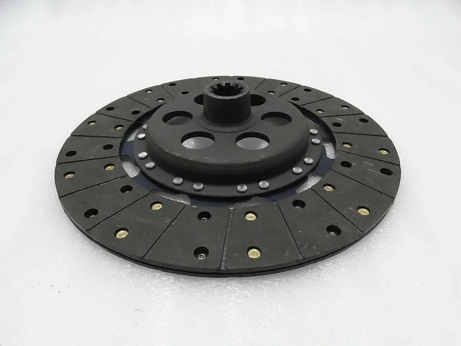 Black clutch plate for Massey Ferguson model, durable material with multiple friction surfaces for optimal performance