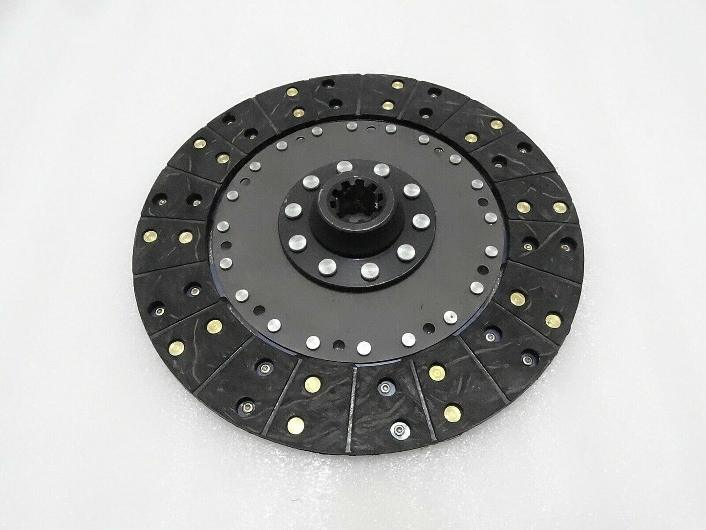 Massey Ferguson black clutch plate with 10-spline center and riveted pressure segments