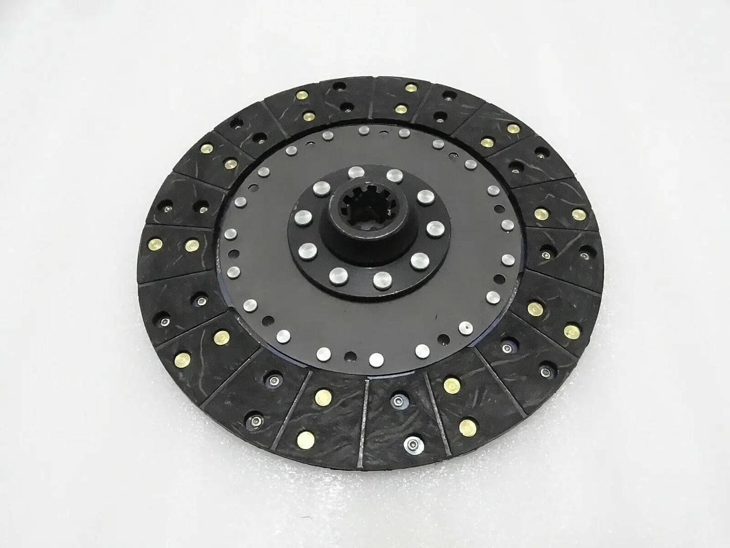 Massey Ferguson black clutch plate with 10-spline center and riveted pressure segments