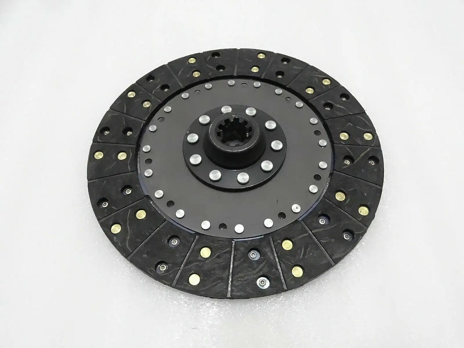 Massey Ferguson black clutch plate with 10-spline center and riveted pressure segments