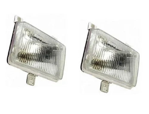 Tractor headlight pair with clear lens and rectangular metal housing