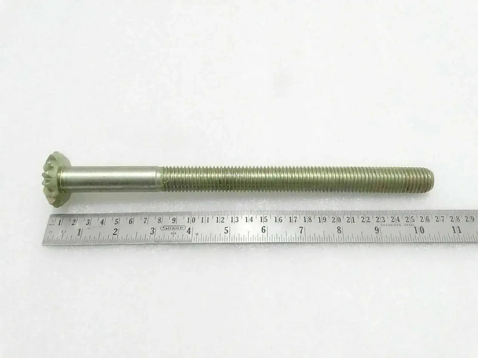 Massey Ferguson model shaft, metal, 10-inch length, used in tractor repair and maintenance
