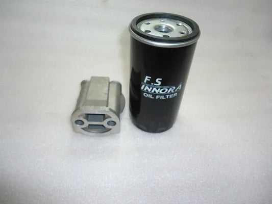 Oil filter head assembly for Massey Ferguson model with metal component and cylindrical filter