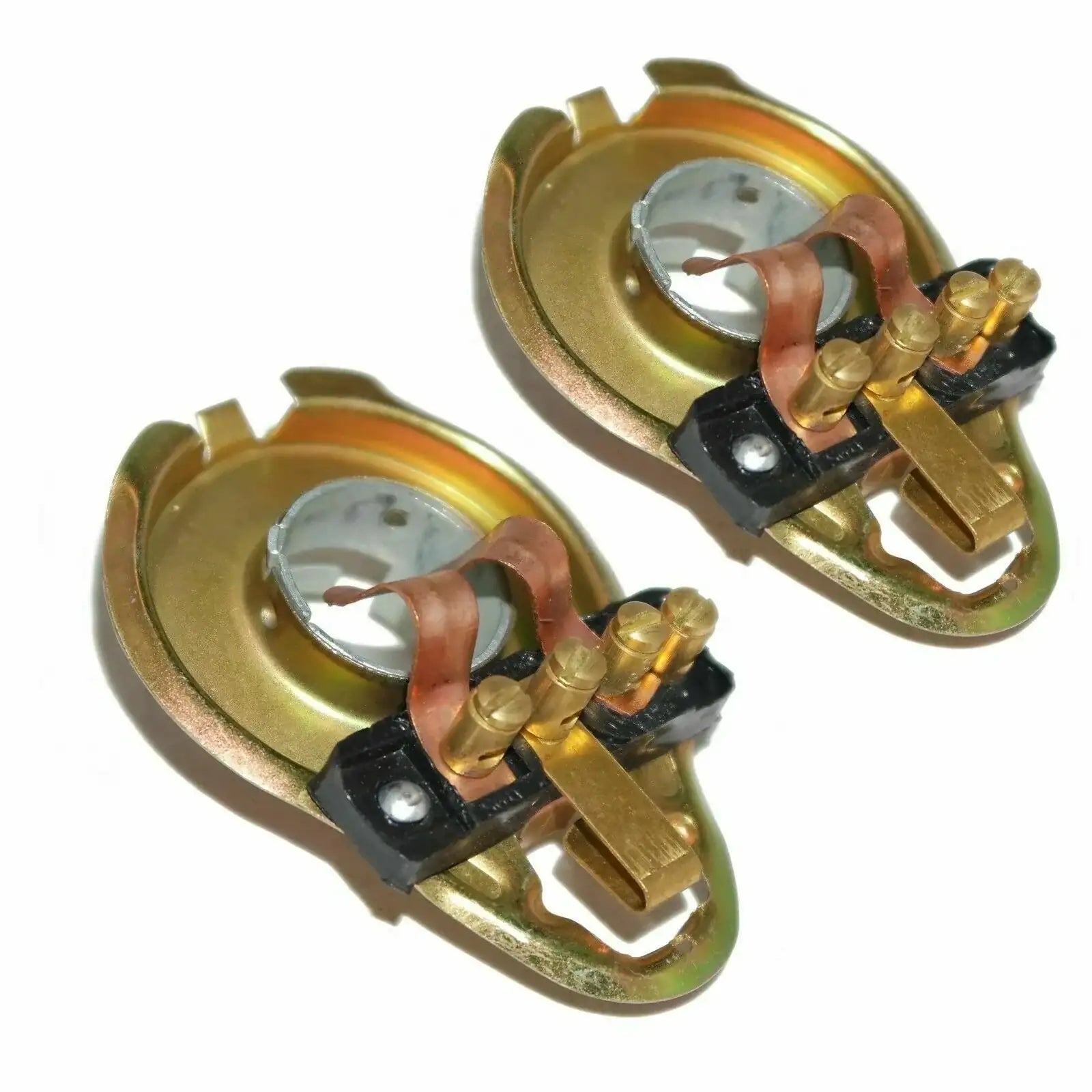 Headlight bulb holder set with brass sockets and black electrical terminals, pair