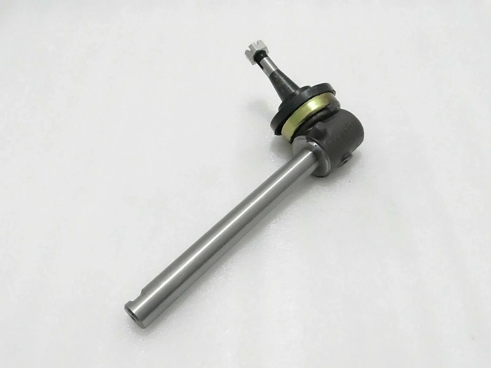 Spindle shaft for Massey Ferguson model, sturdy steel construction, designed for reliable tractor performance
