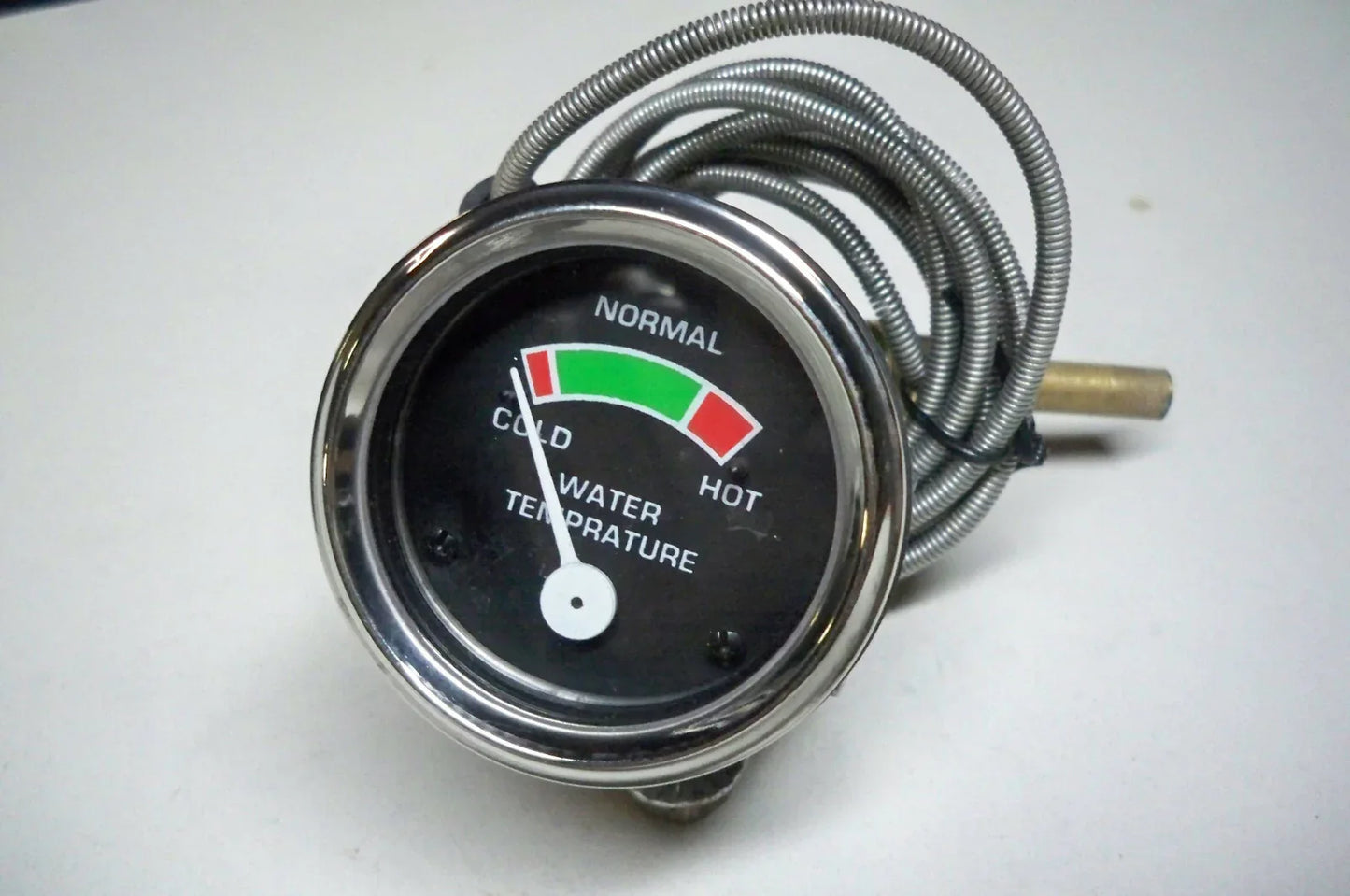 Massey Ferguson model temperature gauge with metal casing and temperature indicator for tractors
