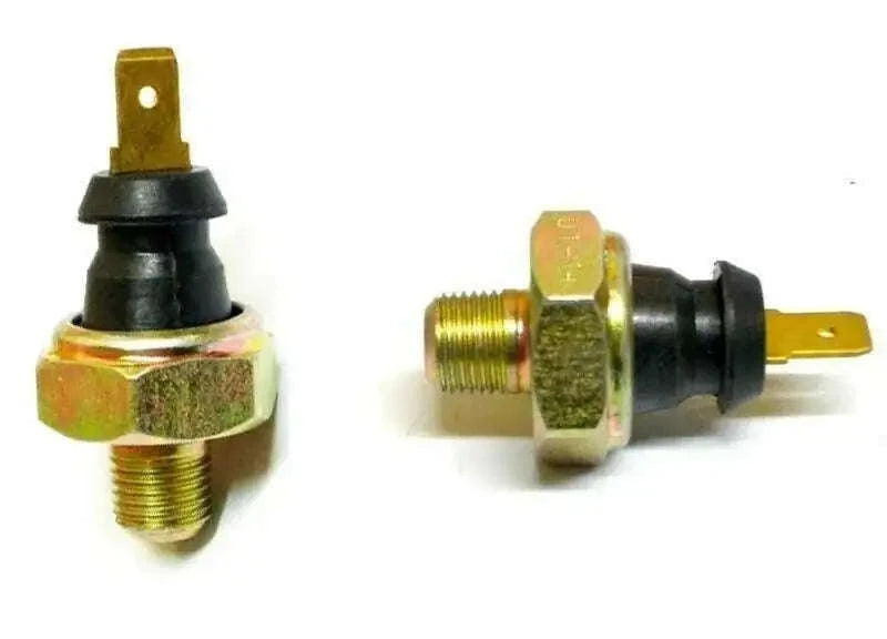 Oil pressure switch with gold hex fittings and black plastic connector