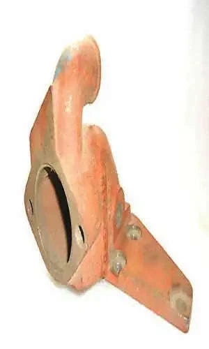 Massey Ferguson 135 cylinder head body, rusty orange metal with mounting holes