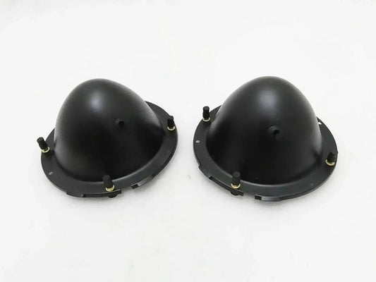 Pair of black headlight holding buckets with mounting tabs and screws