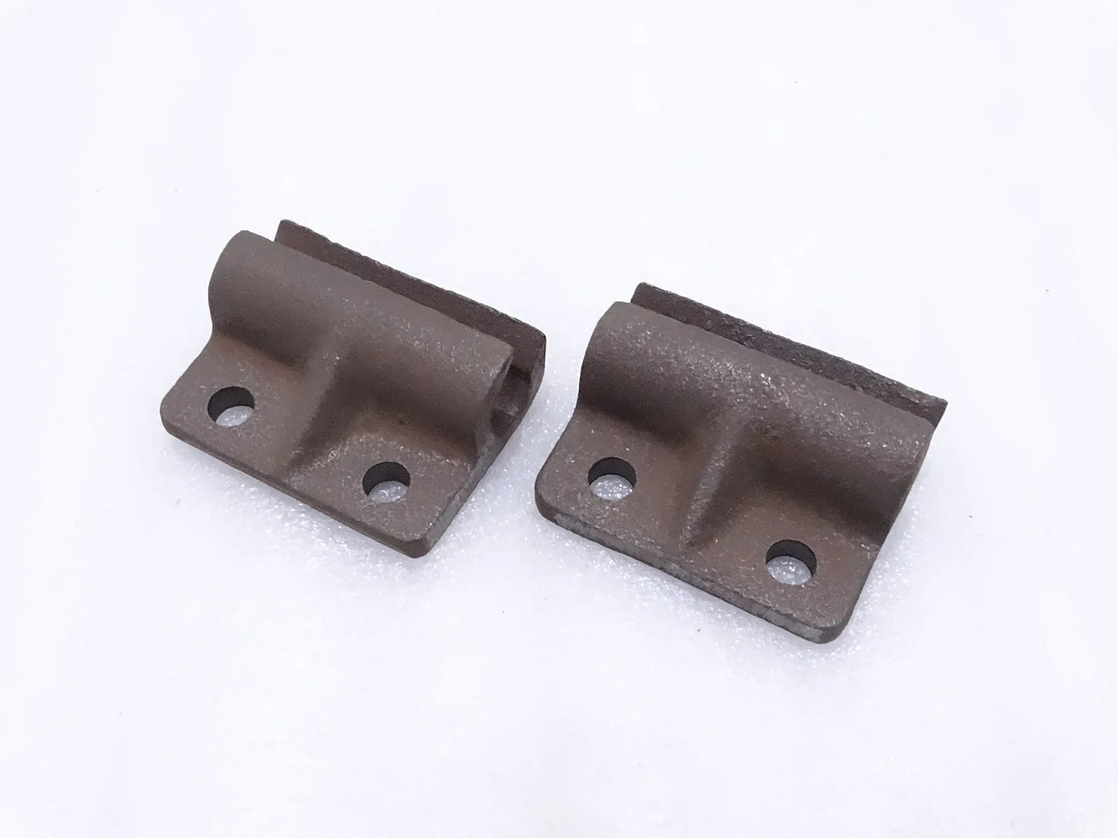 Tailgate door hinges, dark metal with bolt holes