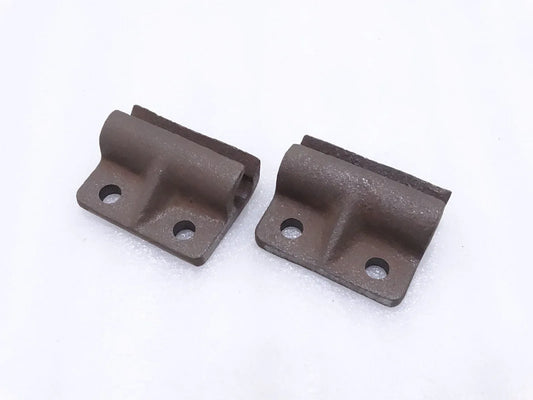 Tailgate door hinges, dark metal with bolt holes