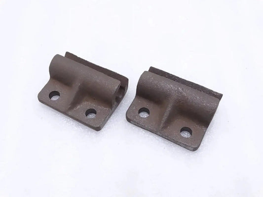 Tailgate door hinges, dark metal with bolt holes