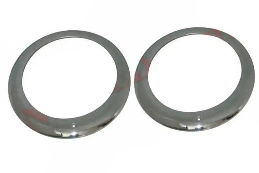 Chrome-plated headlight outer bezel pair, two circular rings with mounting holes