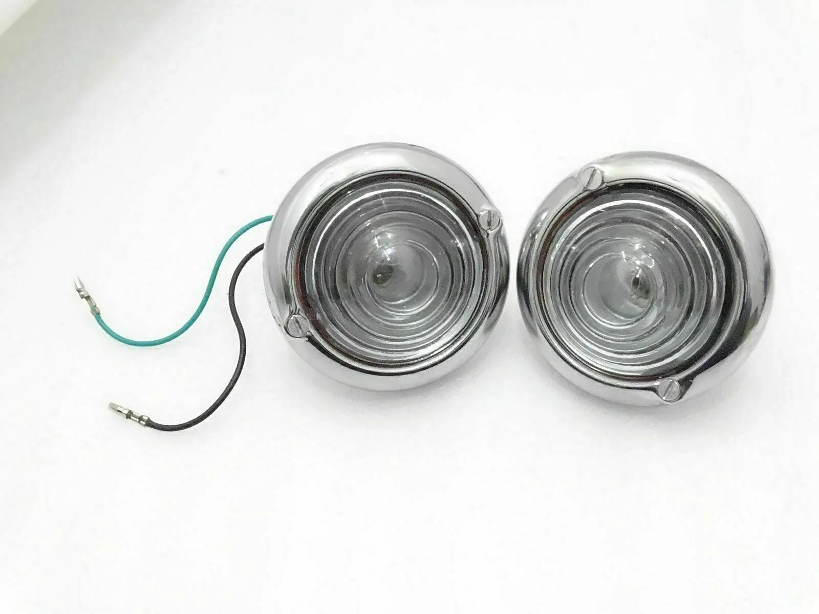 Pair of chrome clear turn signal indicator lights with round lenses