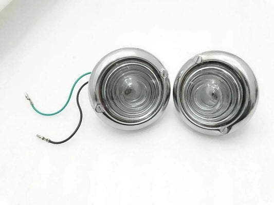 Pair of chrome clear turn signal indicator lights with round lenses