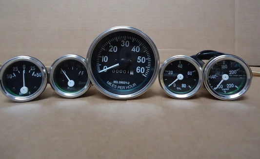 Analog vehicle gauges kit with chrome bezels, five round dials and black faces