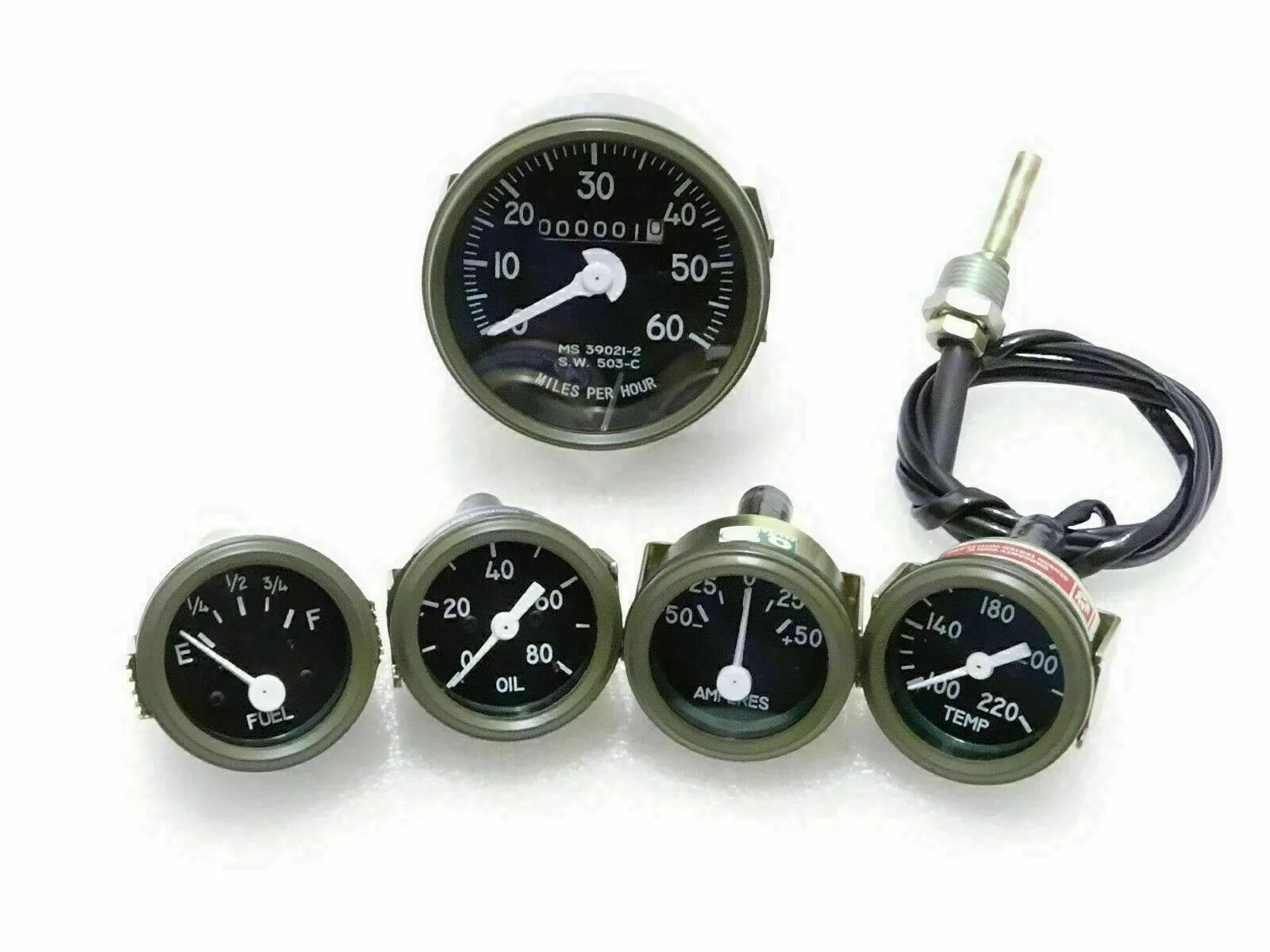 Green-bezel vehicle gauges set with speedometer, fuel, oil, temp, and amp meters
