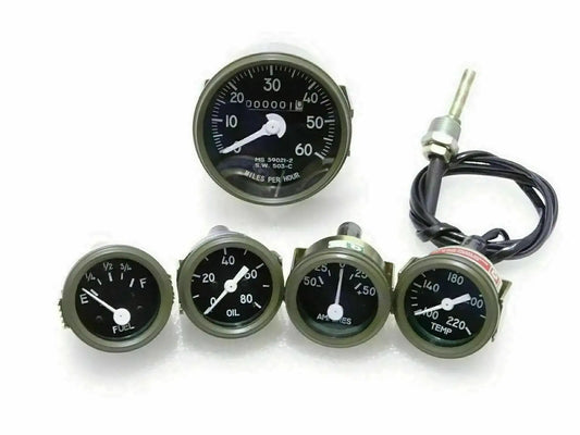 Green-bezel vehicle gauges set with speedometer, fuel, oil, temp, and amp meters