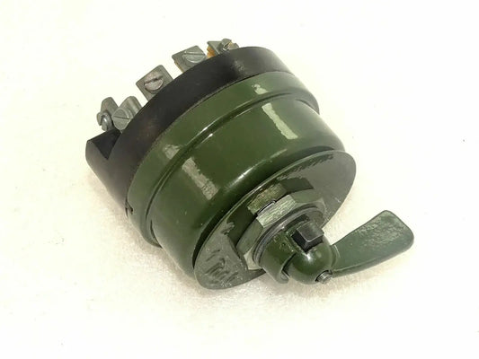 Headlight dimmer switch with green housing and metal terminal posts