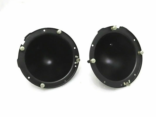 Pair of black headlight mounting buckets with screw holes and small brackets