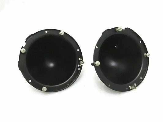 Pair of black headlight mounting buckets with screw holes and small brackets