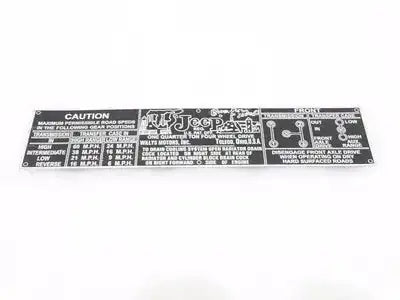 Aluminum transfer case information plate with caution and specifications text, rectangular