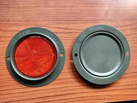 Late M-series reflector assembly with orange round lens and gray bezel