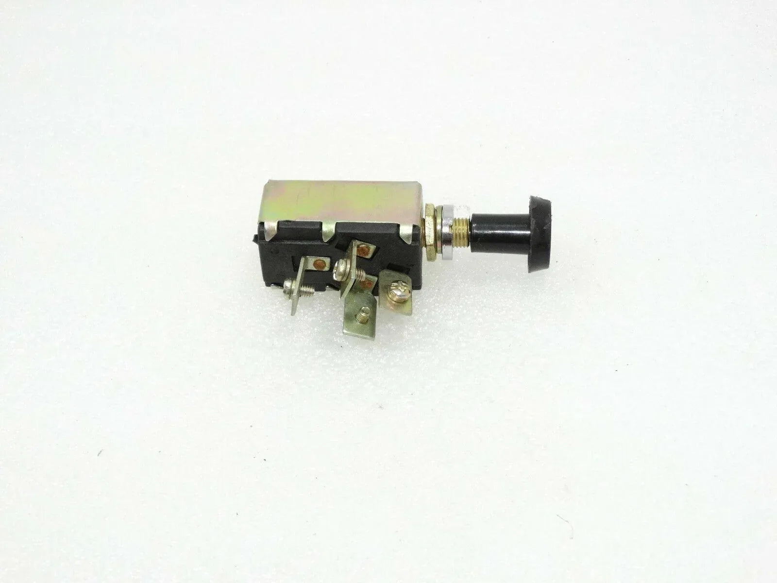 Headlight on/off switch with black housing and metal threaded stem, three wiring terminals