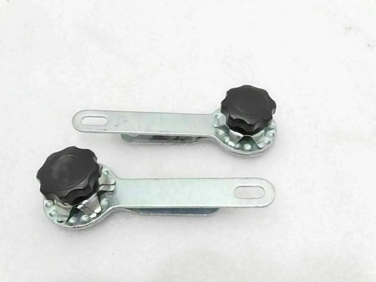 Windshield frame holding adjustment arms with black knobs, metal brackets