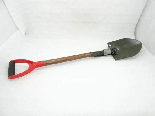 Military shovel with green metal blade, wooden handle, red grip