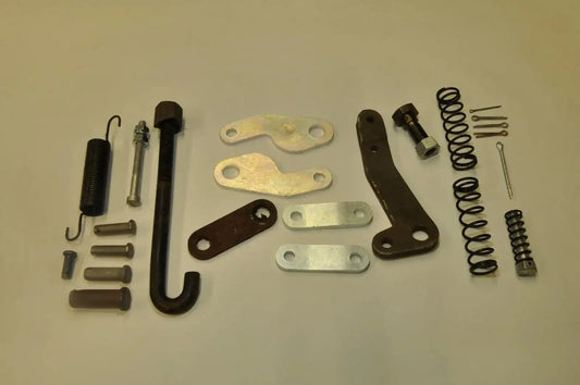Brake handbrake mounting hardware kit with brackets, springs, bolts, and pins