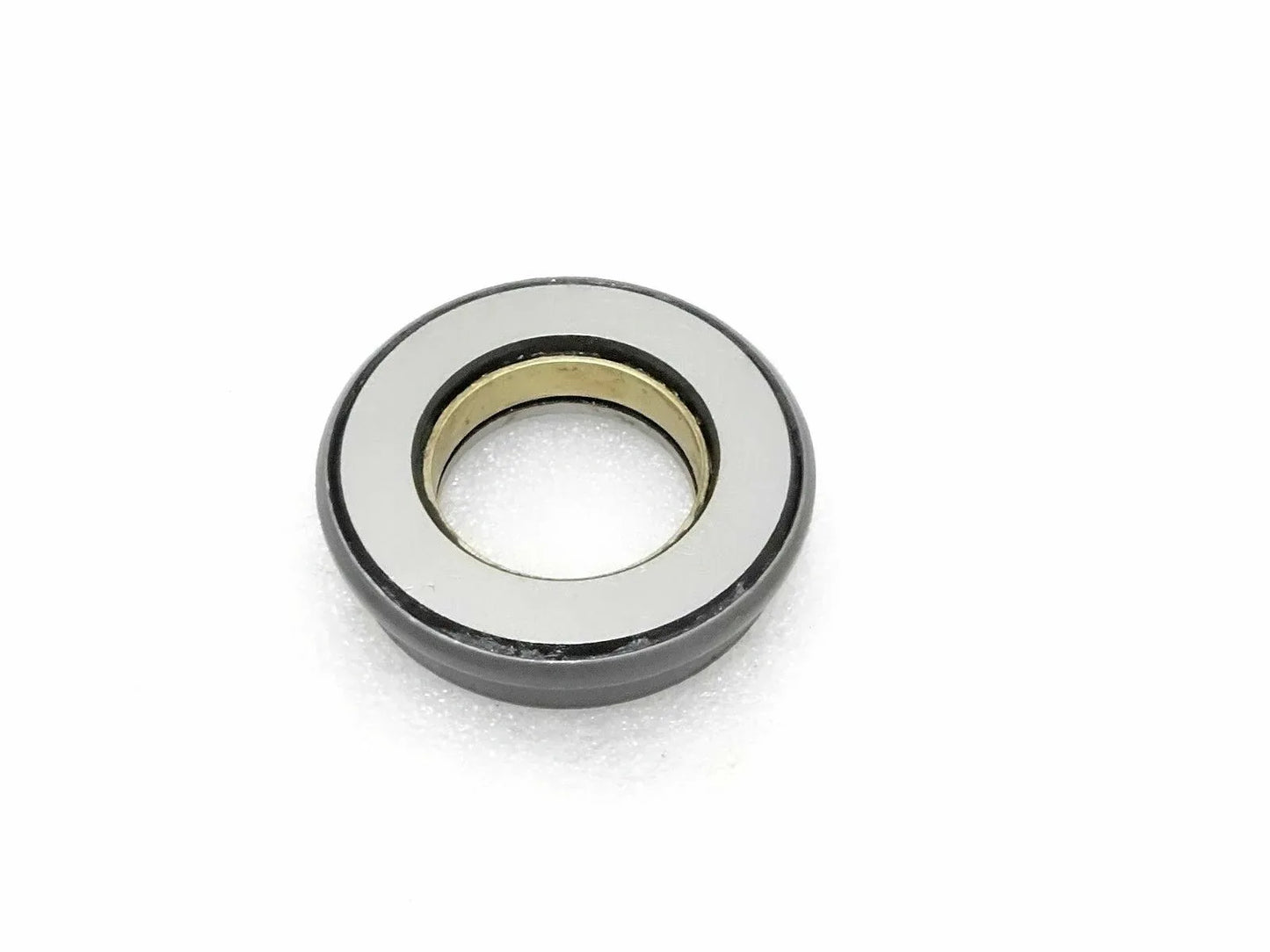 Clutch throw outer bearing with dark metal outer ring and brass inner race
