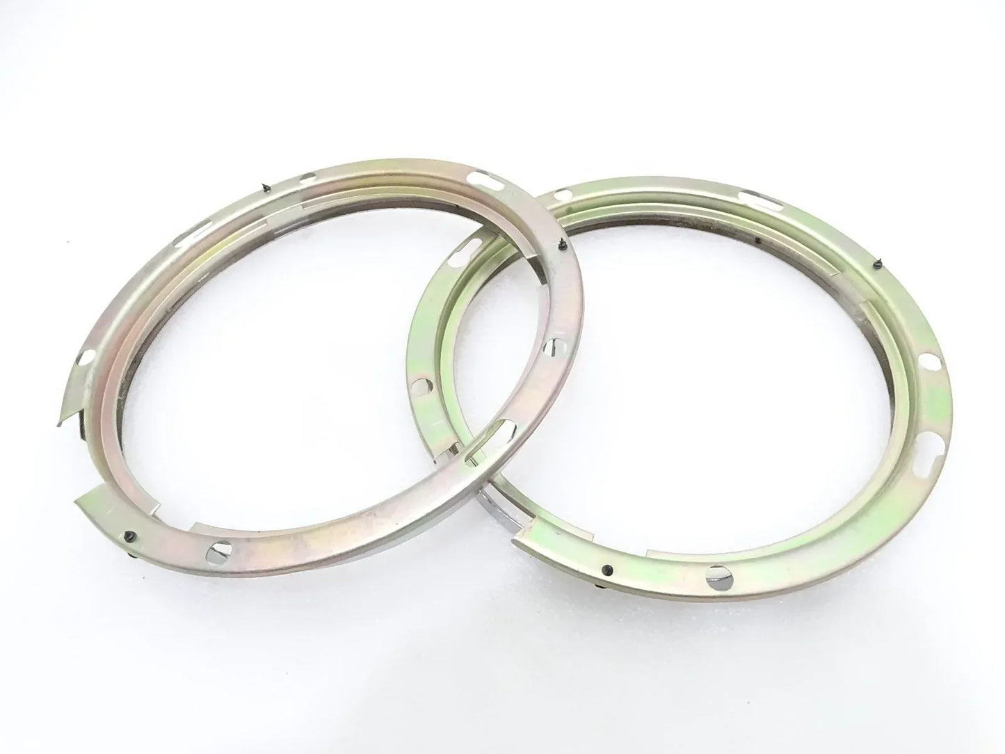 Headlight bezel retaining rings, 7-inch pair, silver metal with mounting holes