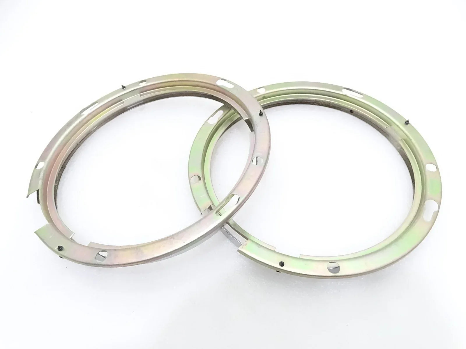 Headlight bezel retaining rings, 7-inch pair, silver metal with mounting holes