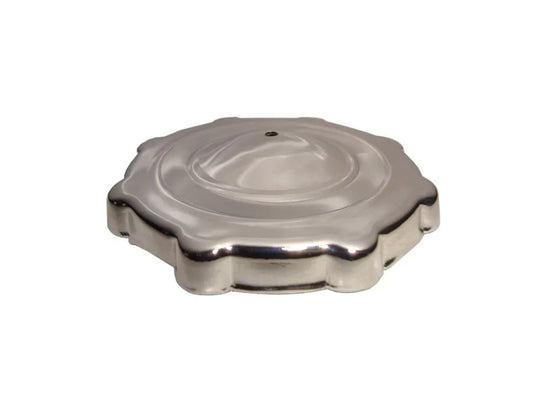 Metal push-style fuel tank cap with circular top