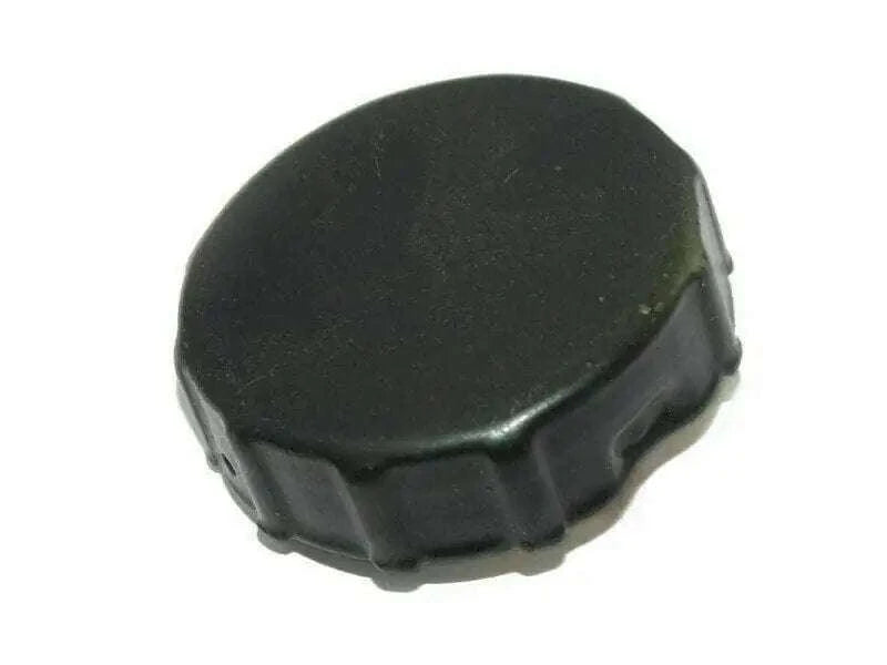 Black steel fuel tank cap cover with ridged edge