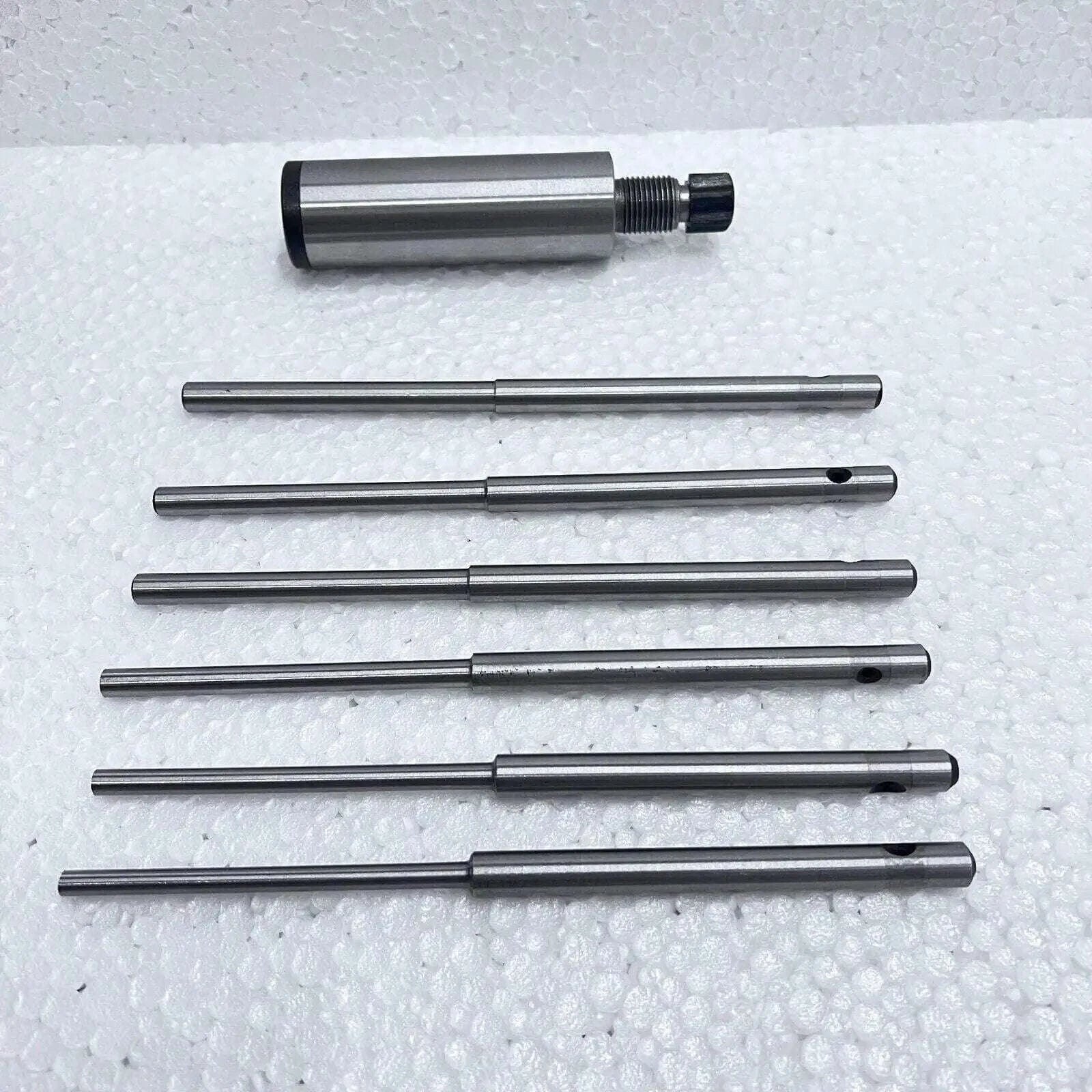 Valve seat grinding stone holder, steel, includes multiple grinding pilots for precision use