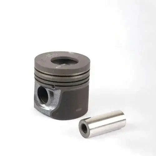 Tractor engine piston with wrist pin, dark metal, ring grooves and top bore