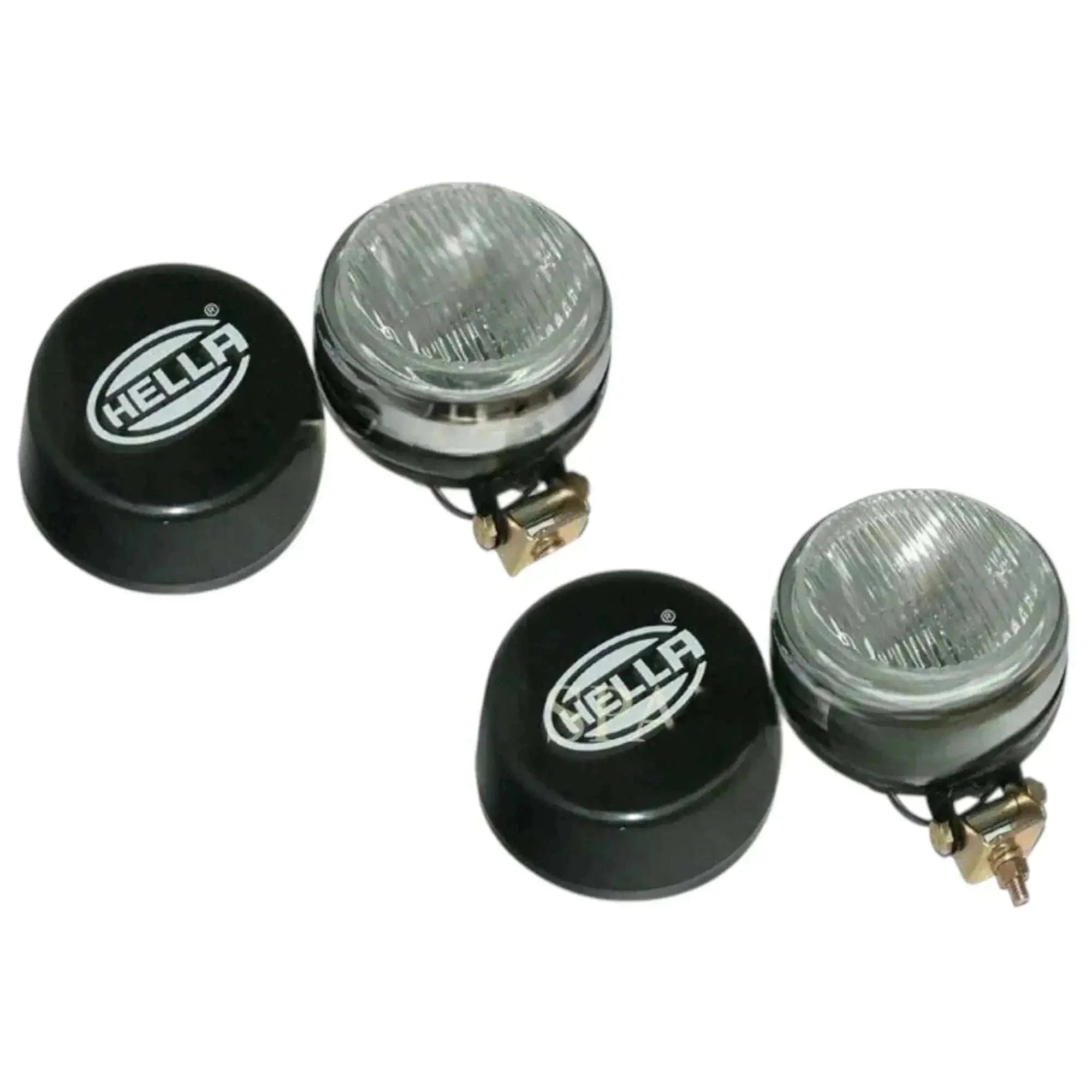Pair of fog lamps with clear lenses and black covers, Hella-branded