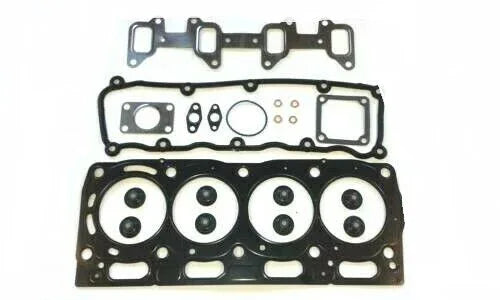 Engine head gasket set with metal and rubber gaskets, bolts, and seals