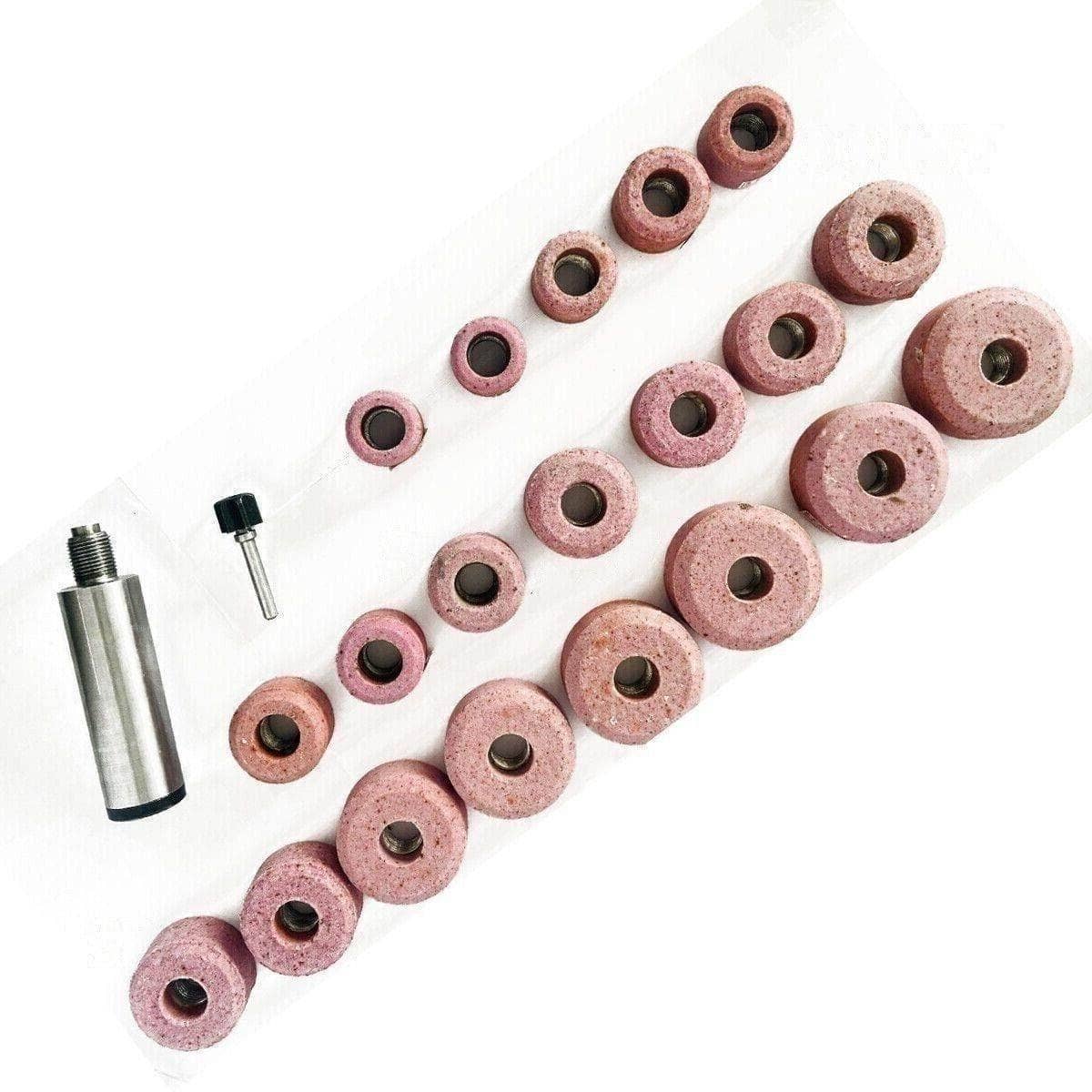 Pink valve seat grinding wheels set including various sizes and a tool attachment