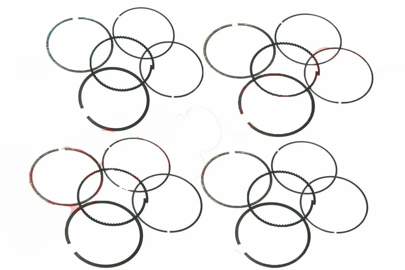 Engine piston ring set with multiple metal rings