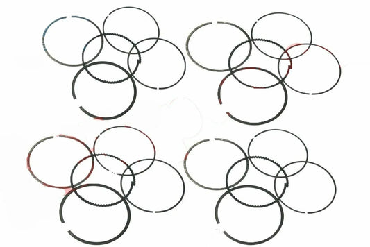Engine piston ring set with multiple metal rings