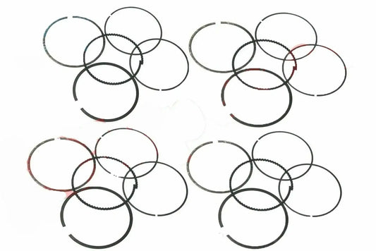 Engine piston ring set with multiple metal rings