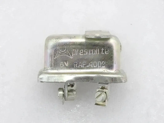 6-volt horn relay with metal housing and two electrical terminals