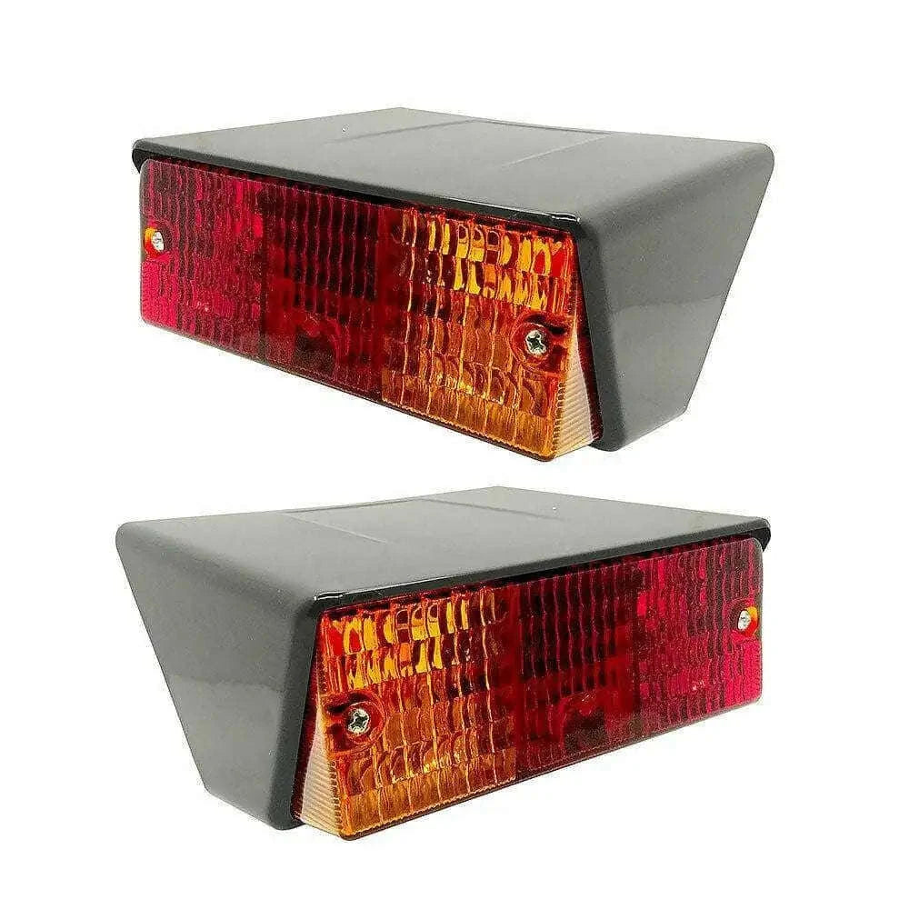 Rear combination light set with red and amber rectangular lenses in gray housing